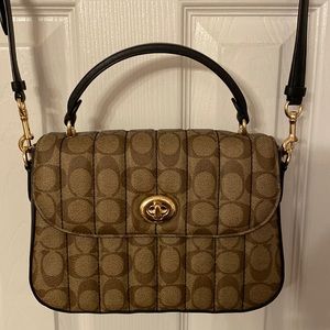 New without tags. Coach bag. Non smoking. No pet home.